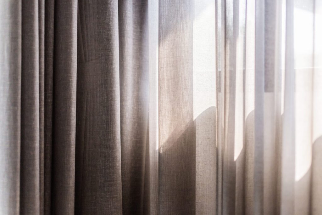 beautiful soft curtain with daylight background scaled 1